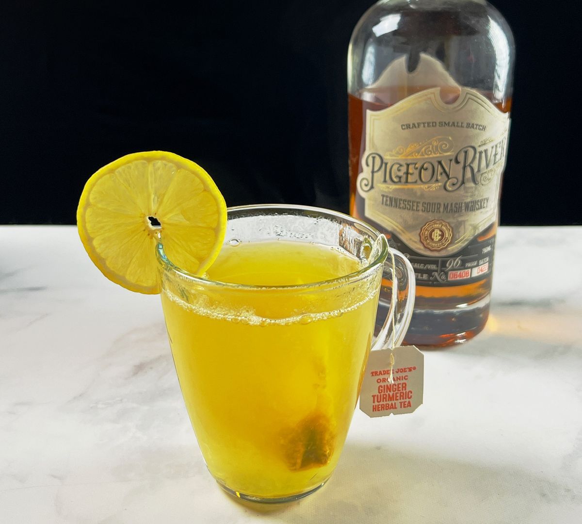 This is a hot toddy riff with a tropical twist, brining in passionfruit syrup and ginger/turmeric. Between the flavors and the bright yellow color, it will get you thinking of warmer days!